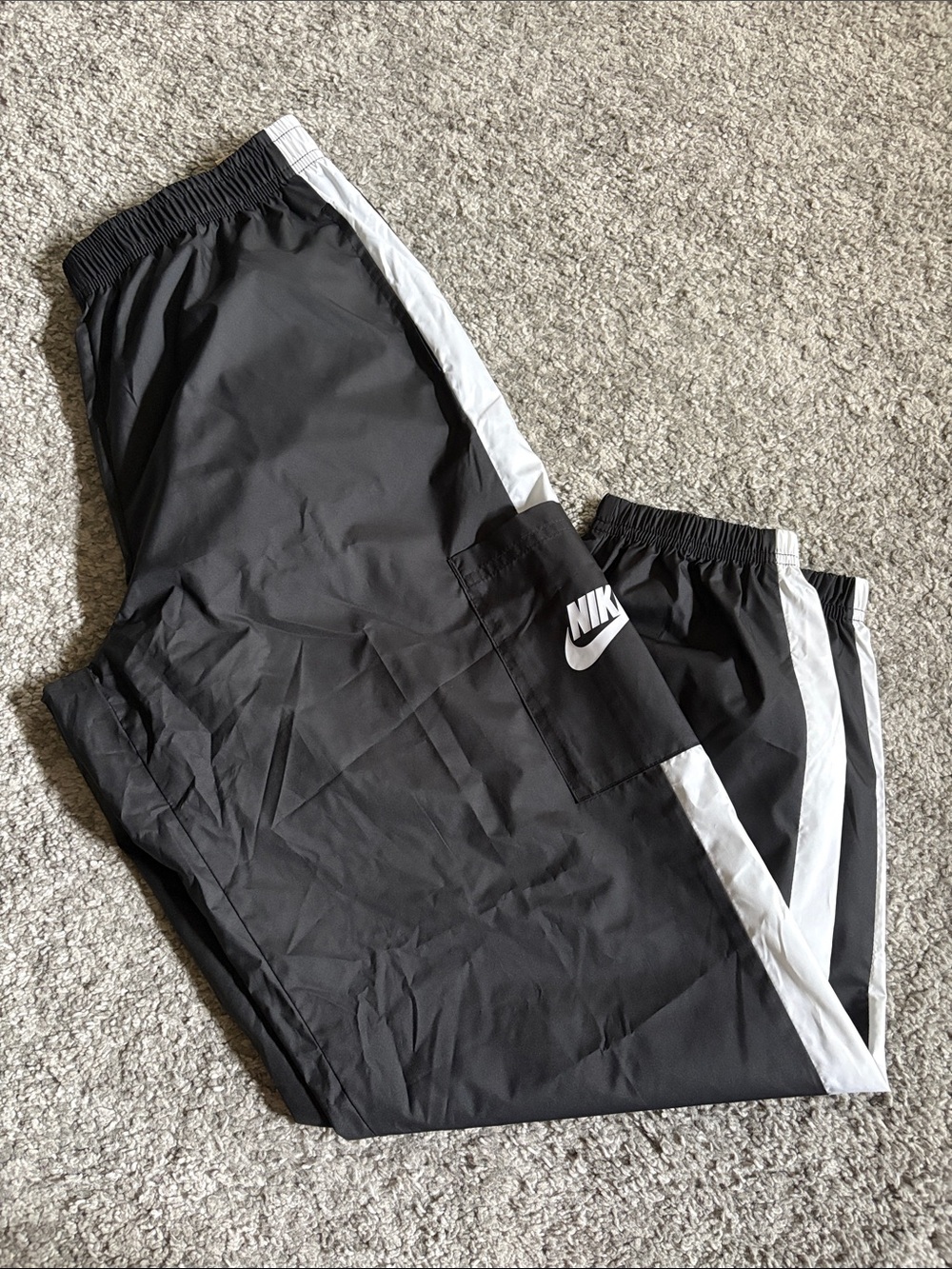 Nike standard fit mid rise women’s Black Joggers with White Side Stripes Pocket